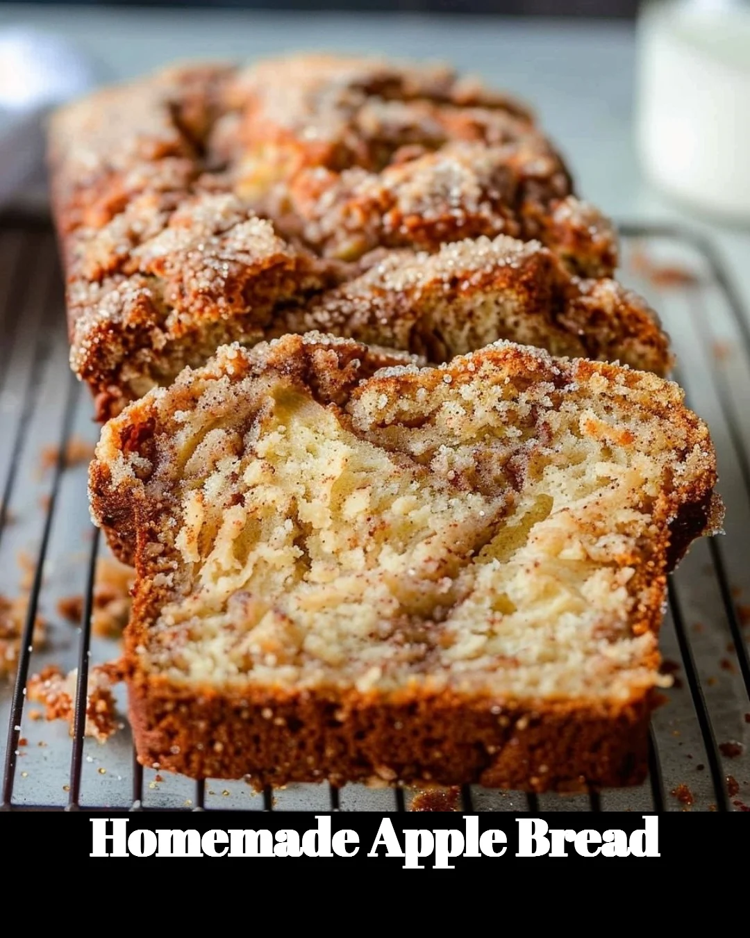 Freshly baked homemade apple bread with slices showing tender texture