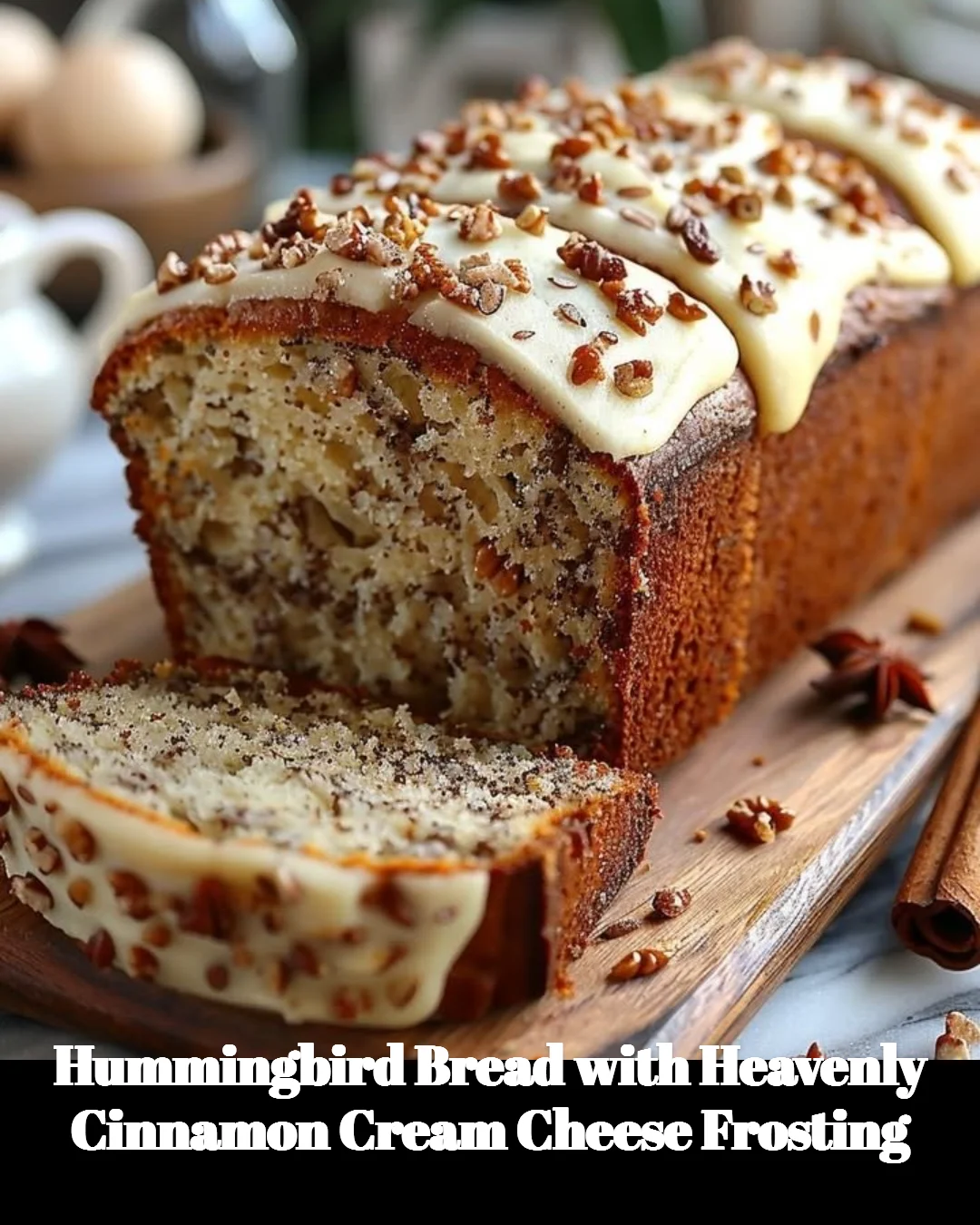 Sliced Hummingbird Bread with creamy cinnamon frosting on top.