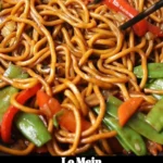 Bowl of flavorful Lo Mein noodles with vegetables and protein over a colorful background.