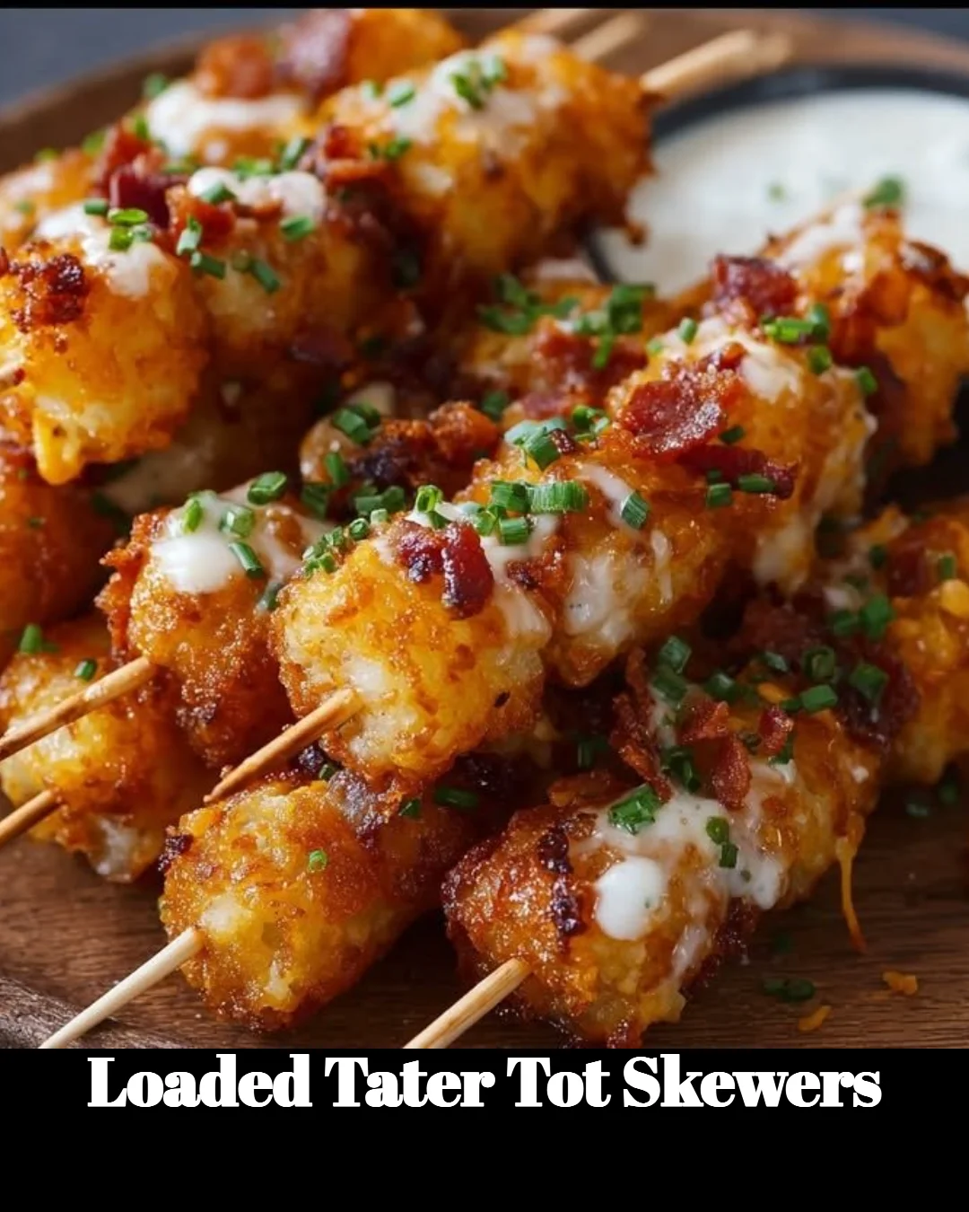 Loaded tater tot skewers topped with cheese, bacon, and green onions.