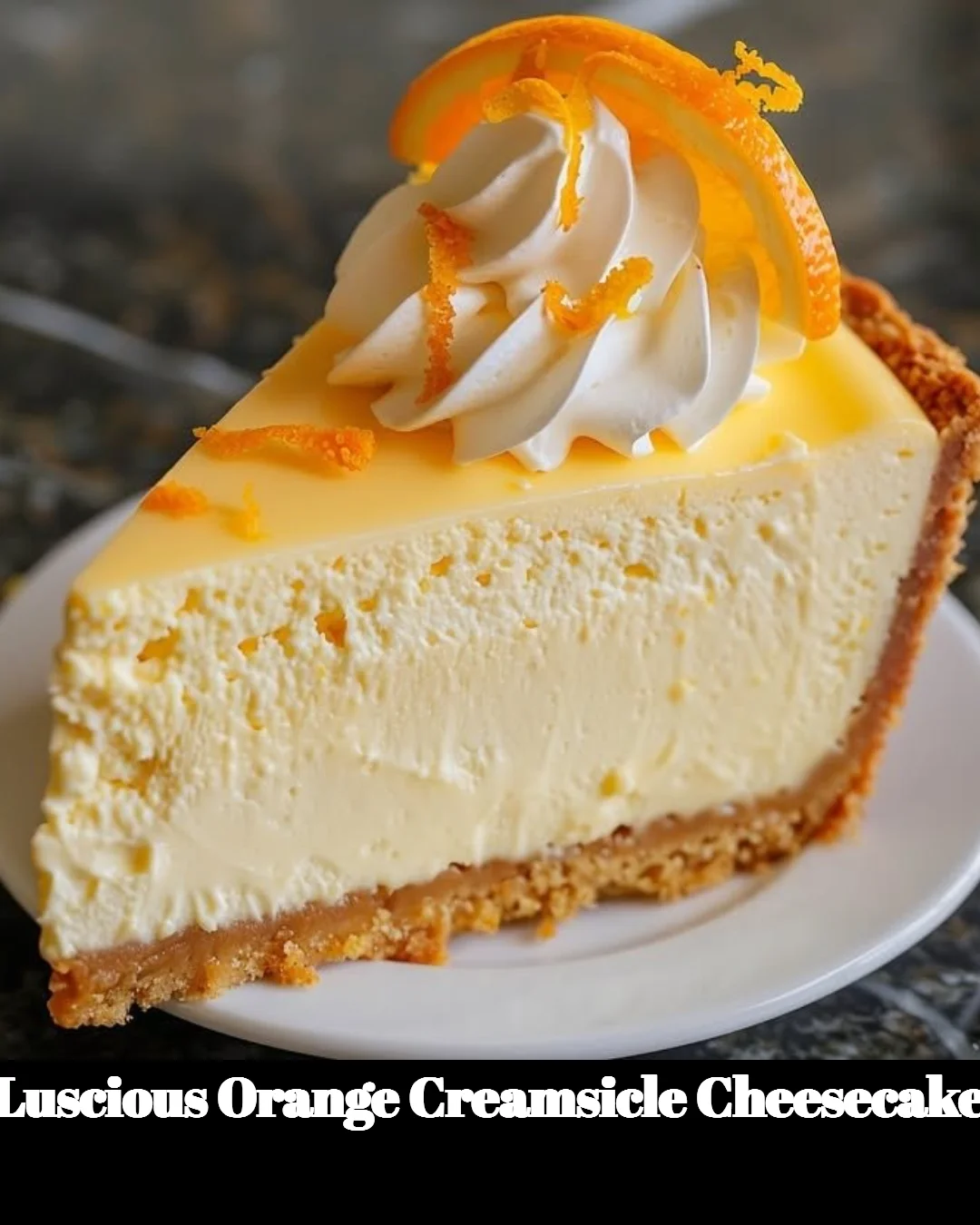 Delicious Orange Creamsicle Cheesecake topped with fresh orange slices.
