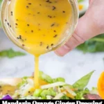 Bowl of vibrant Mandarin Orange Ginger Dressing with fresh ingredients