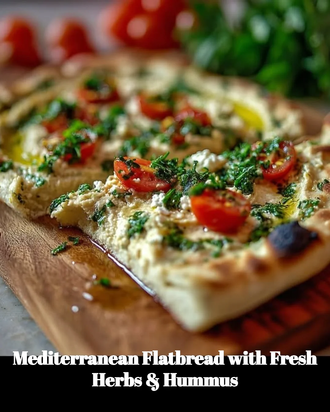 Mediterranean Flatbread with herbs and hummus on a wooden platter
