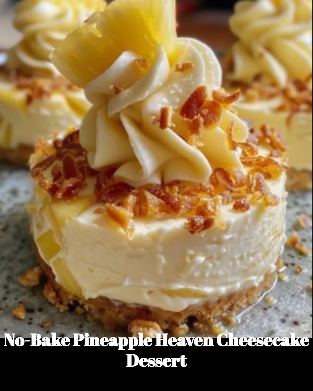 No-Bake Pineapple Heaven Cheesecake Dessert garnished with fresh pineapple slices.