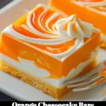 Delicious orange cheesecake bars topped with a citrus glaze