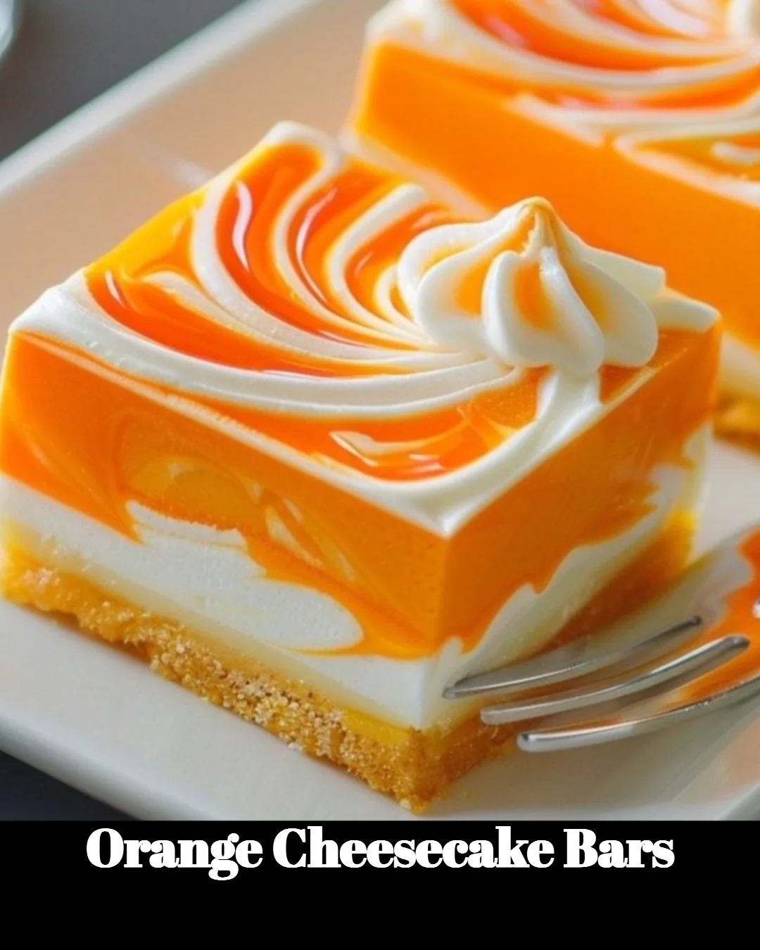Delicious orange cheesecake bars topped with a citrus glaze