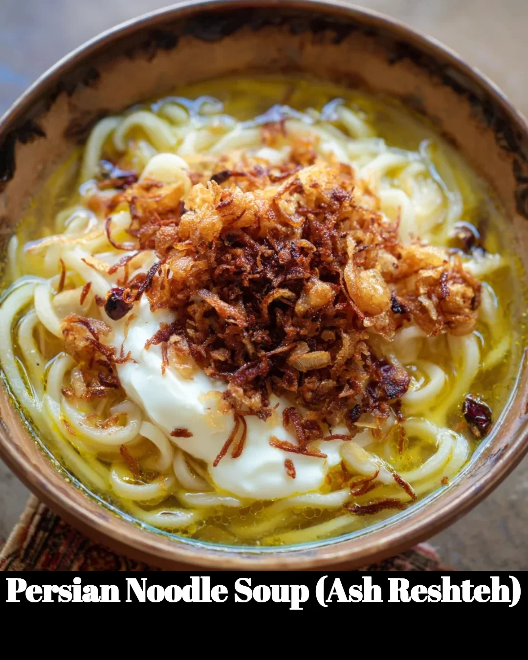 Bowl of flavorful Persian Noodle Soup (Ash Reshteh) garnished with fresh herbs.