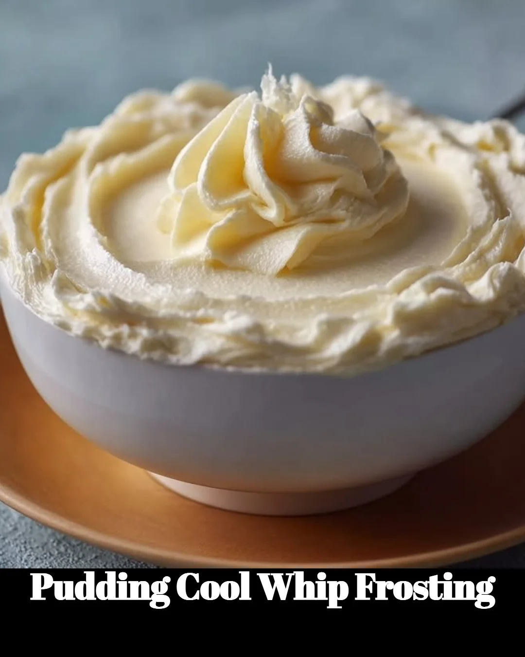 Delicious pudding Cool Whip frosting topping on a cake.