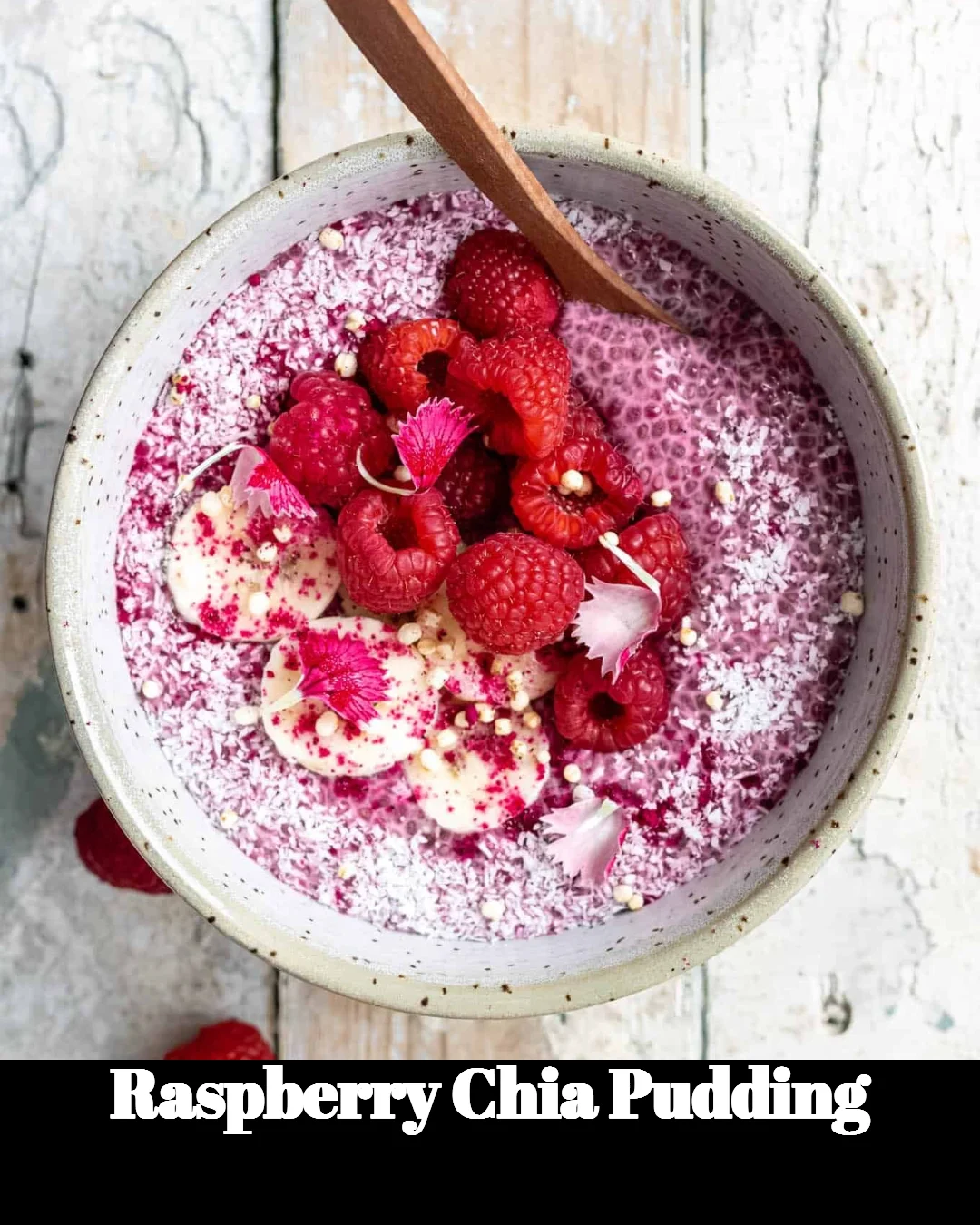 Delicious raspberry chia pudding garnished with fresh raspberries and mint
