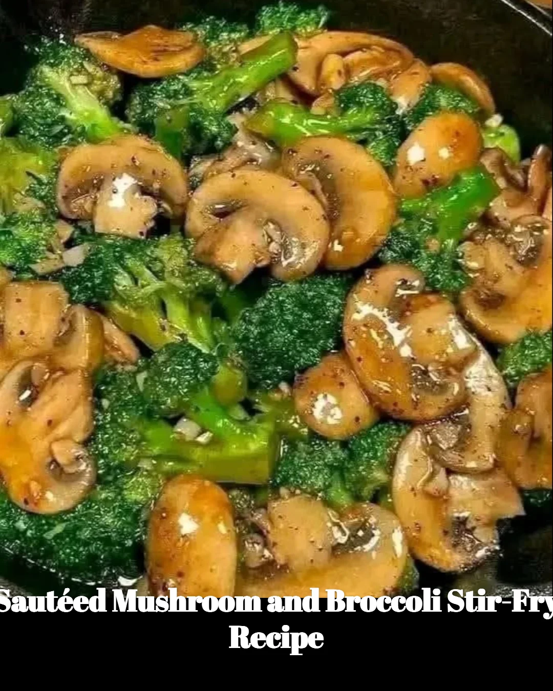 Sautéed mushroom and broccoli stir-fry served in a bowl with chopsticks.