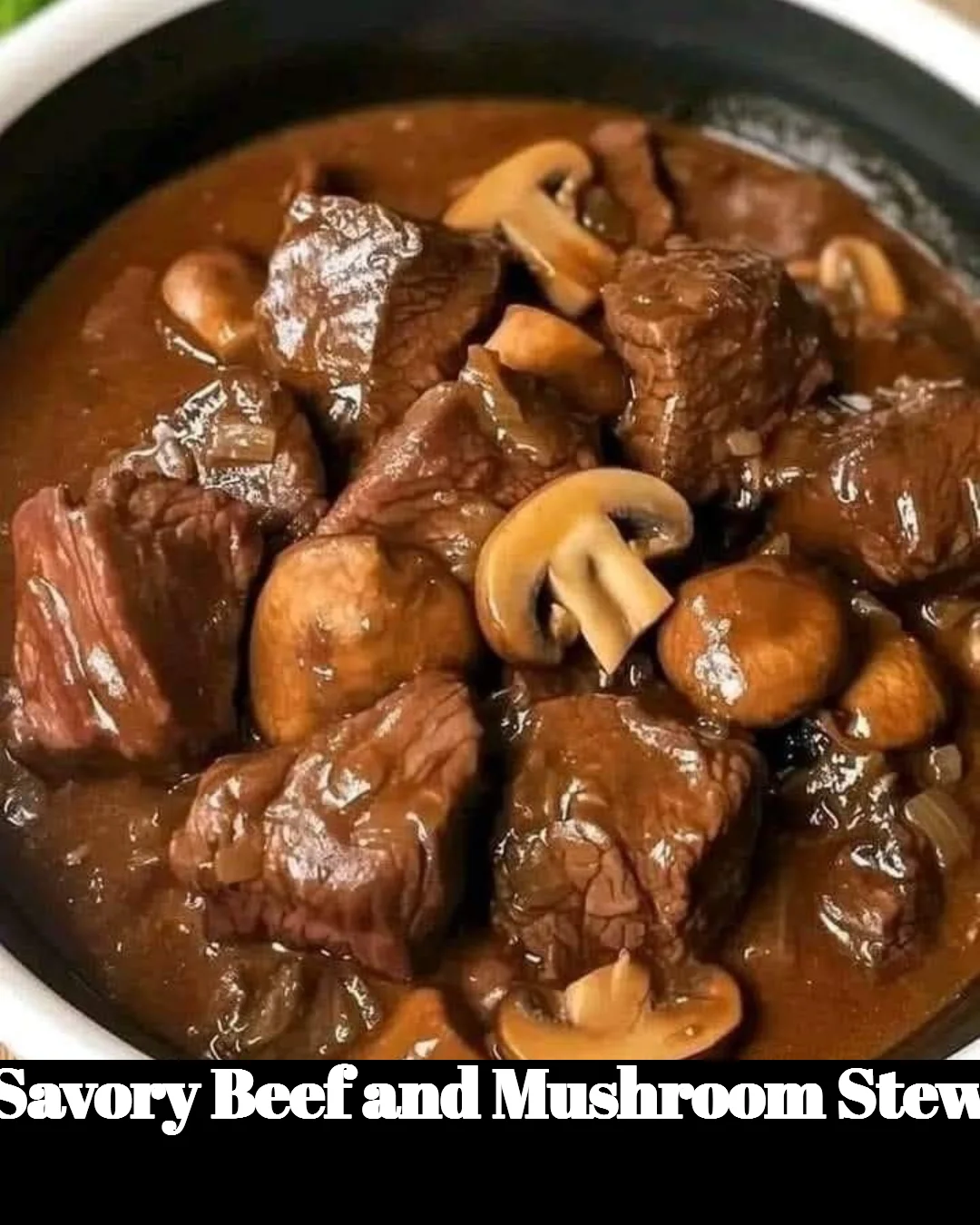 Delicious bowl of savory beef and mushroom stew garnished with herbs