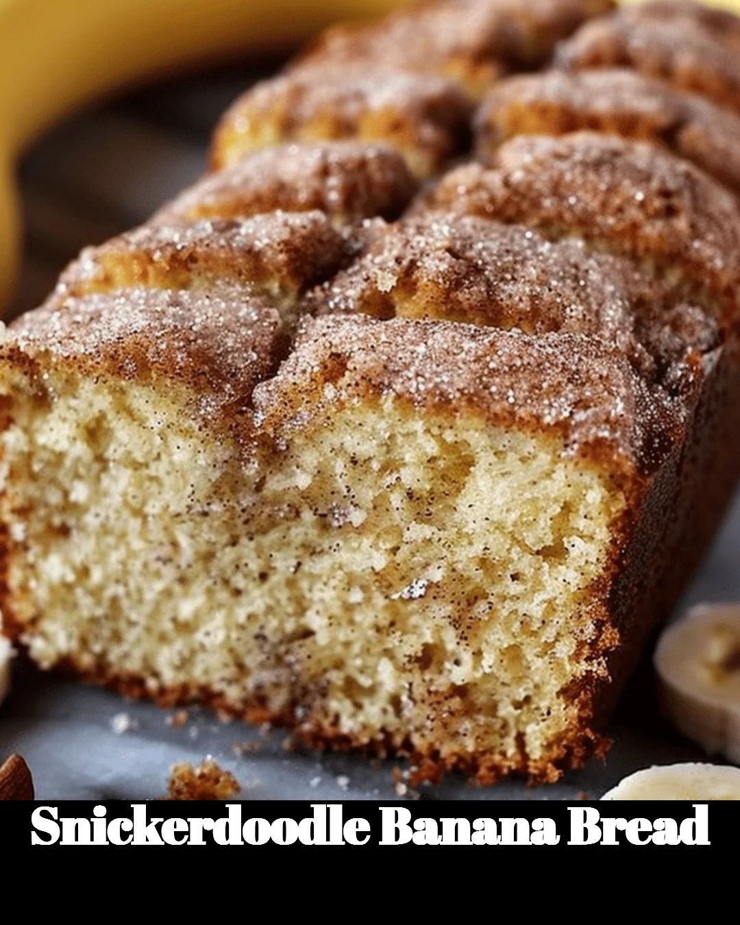 Delicious homemade snickerdoodle banana bread topped with cinnamon sugar.