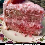 Delicious Strawberry Dream Cake topped with fresh strawberries and cream