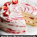 Delicious Strawberry Shortcake Layer Cake with fresh strawberries and cream