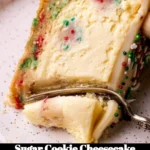 Delicious homemade sugar cookie cheesecake topped with colorful sprinkles
