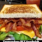 Delicious and stacked BLT sandwich with crispy bacon, lettuce, and tomatoes