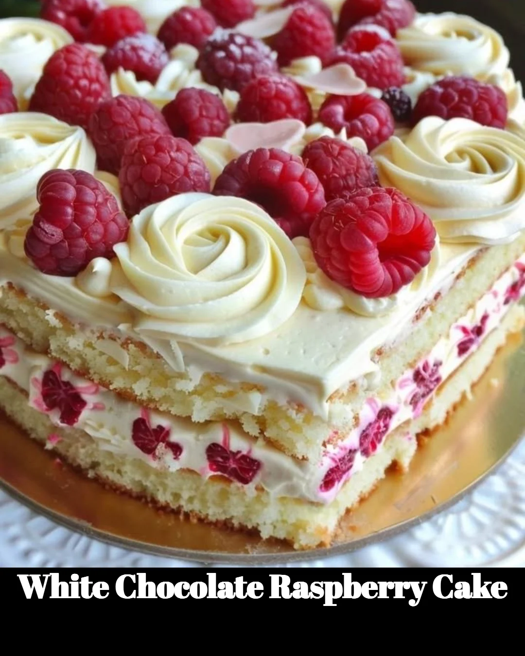 Delicious white chocolate raspberry cake with fresh raspberries on top