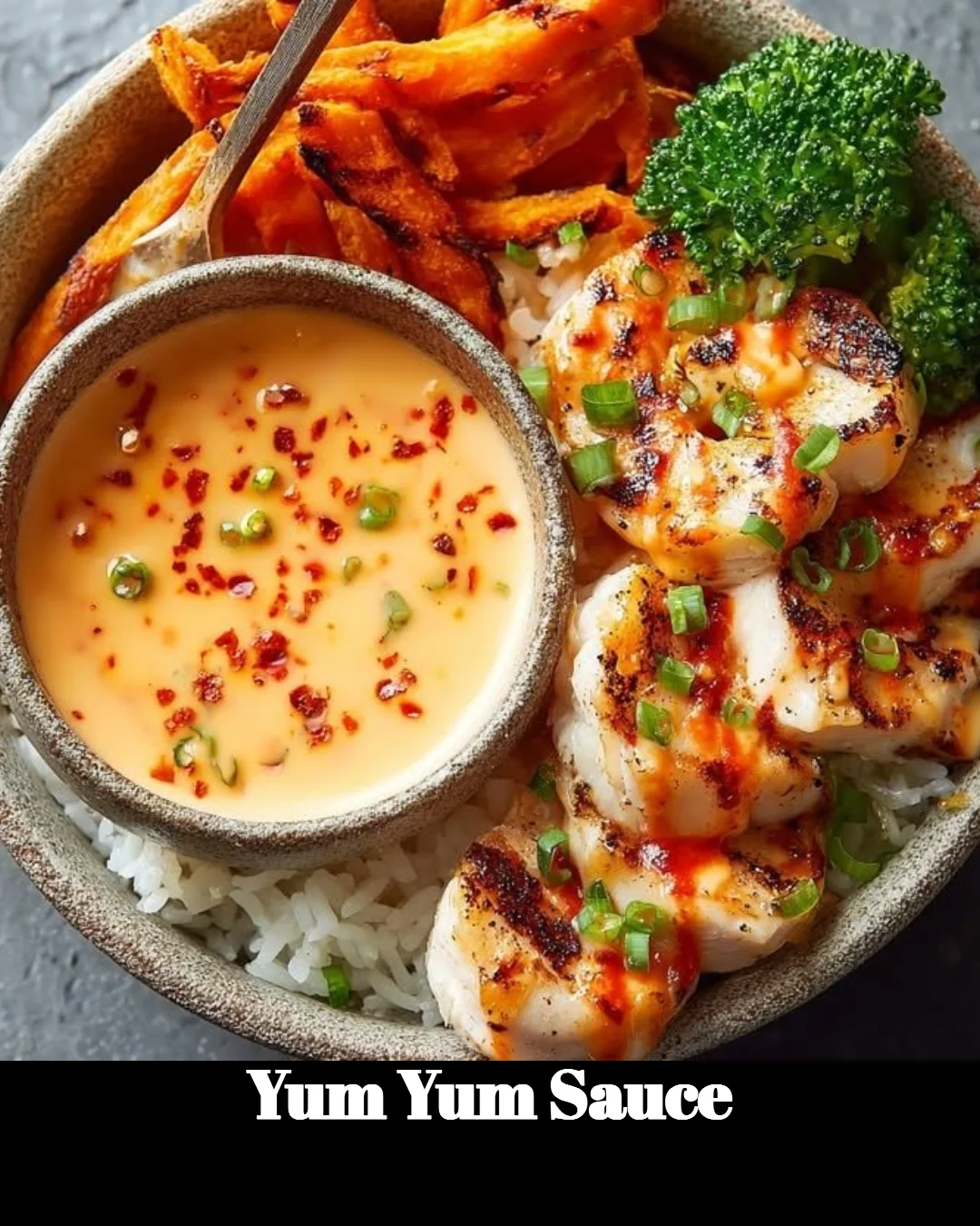 Yum Yum Sauce in a bowl with a spice sprinkle on top