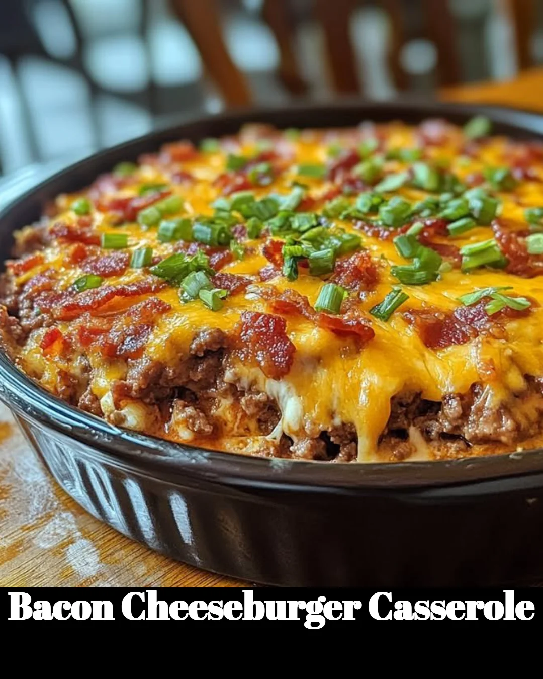 Delicious bacon cheeseburger casserole topped with melted cheese and crispy bacon.
