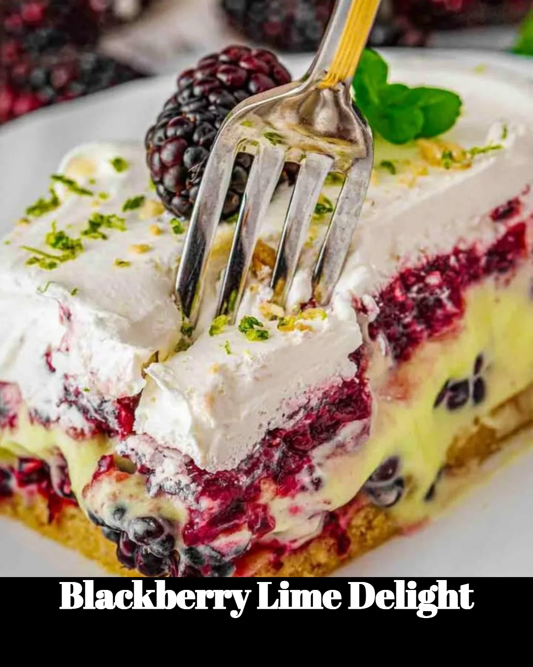 A delicious dessert featuring blackberry lime delight with fresh berries and lime.