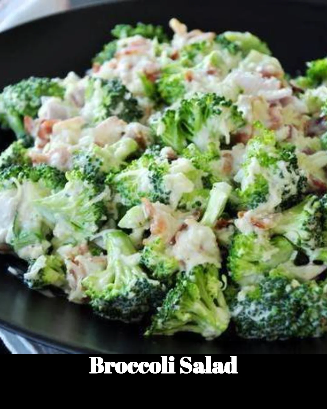 Fresh Broccoli Salad topped with nuts and dressing