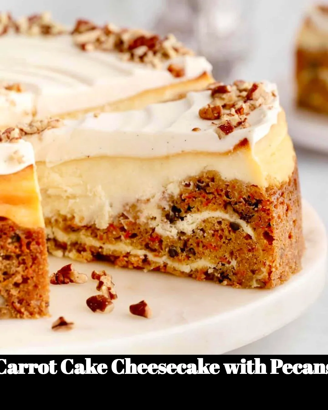 Delicious carrot cake cheesecake topped with pecans on a white plate