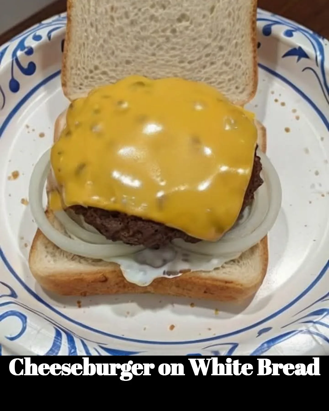 Delicious cheeseburger served on white bread with fresh toppings