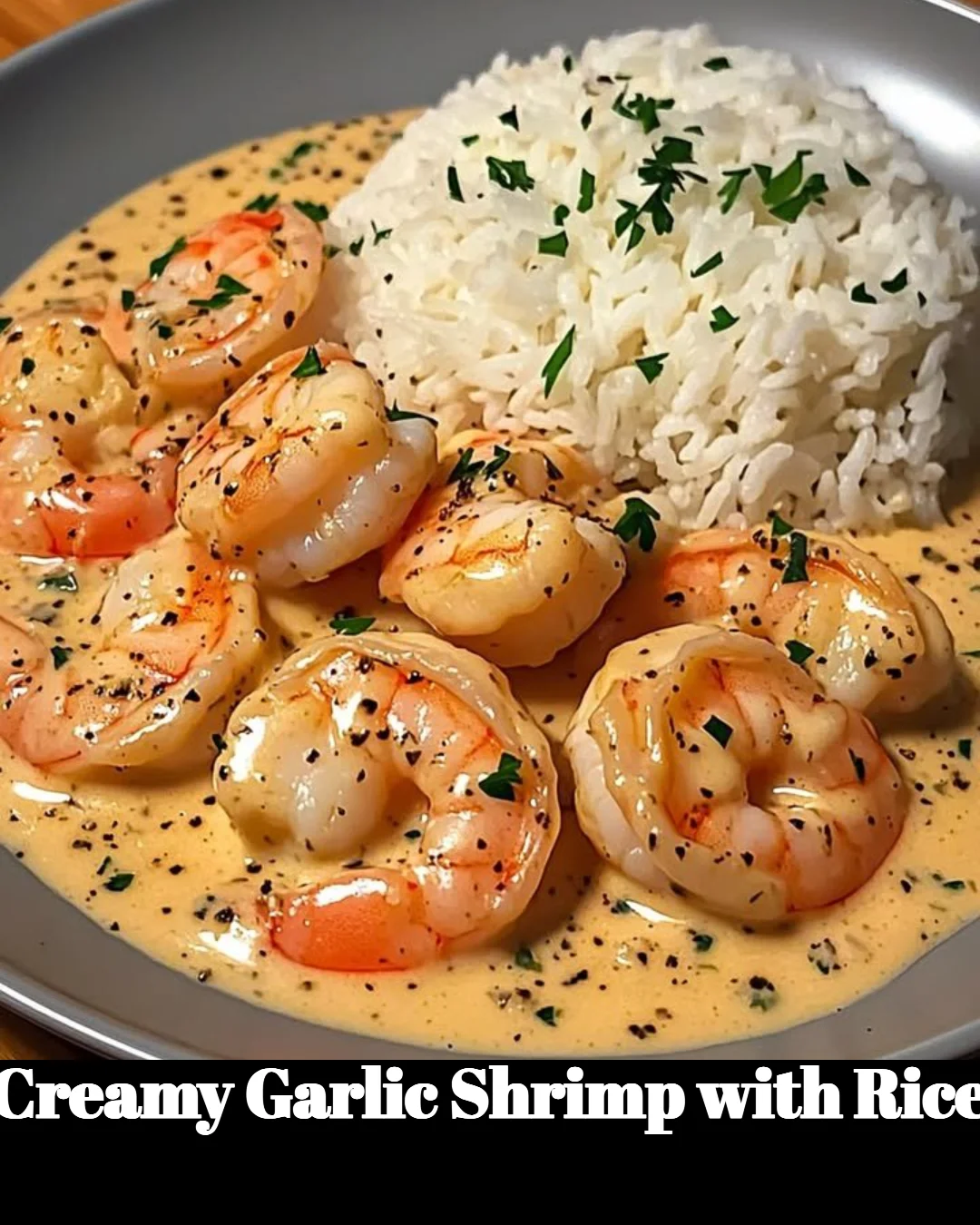 Plate of creamy garlic shrimp served over fluffy rice