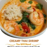 Bowl of creamy Thai shrimp soup with herbs and spices