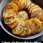Crispy air fryer potato slices served in a bowl