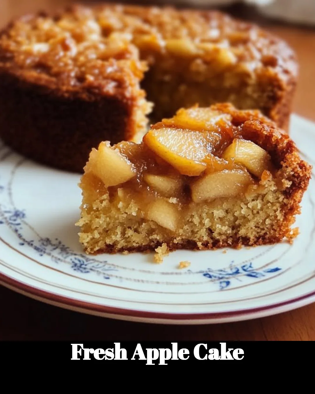 Fresh apple cake with spices and apple slices on a wooden table