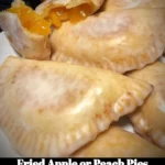 Fried apple and peach pies served on a plate, golden and crispy