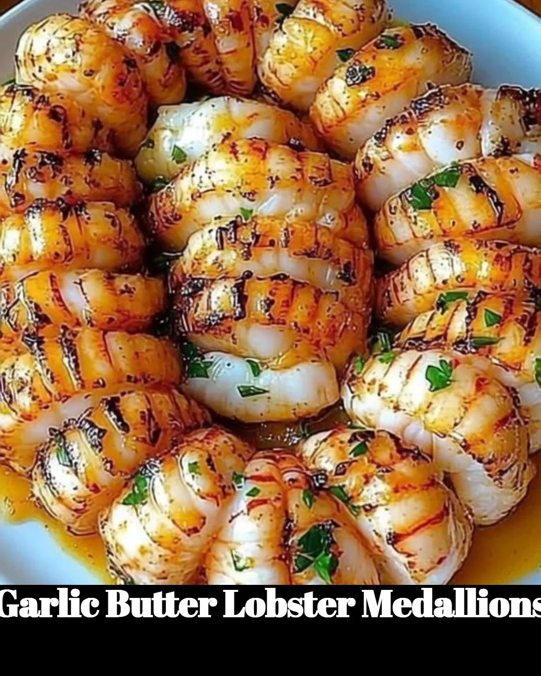 Delicious Garlic Butter Lobster Medallions served on a plate garnished with herbs