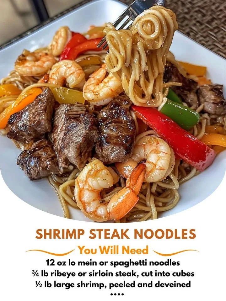 Delicious Garlic Butter Steak served with Shrimp Noodles on a plate.