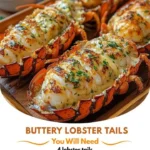 Delicious Garlic Herb Butter Lobster Tails served on a plate with herbs.
