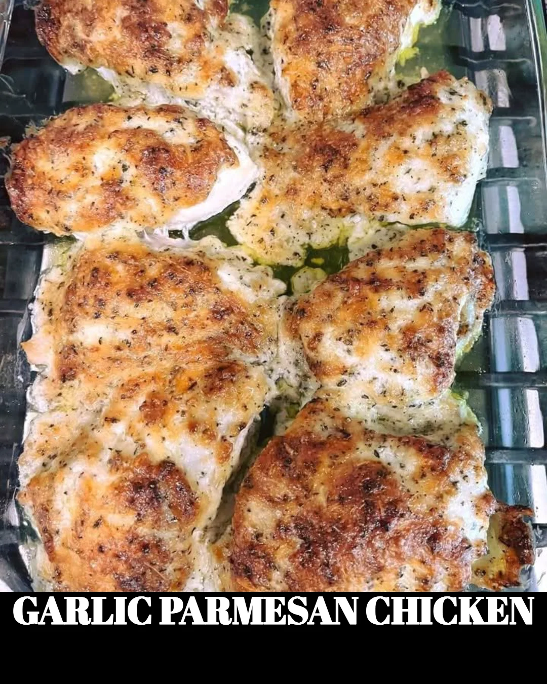 Delicious garlic parmesan chicken served on a plate with herbs