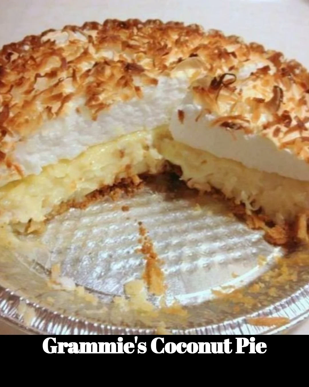 Delicious slice of Grammie's Coconut Pie with creamy coconut filling