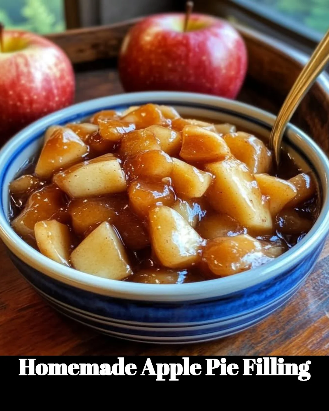 Homemade apple pie filling made with fresh apples and spices in a bowl.