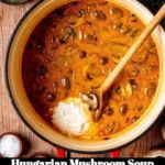 Bowl of creamy Hungarian Mushroom Soup topped with fresh herbs