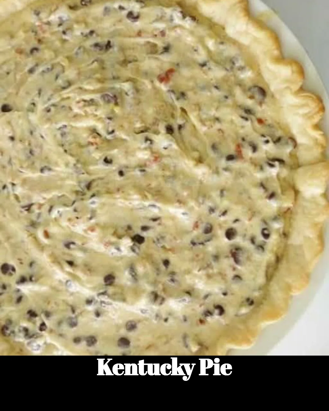 Slice of Kentucky Pie served on a rustic plate with fresh whipped cream