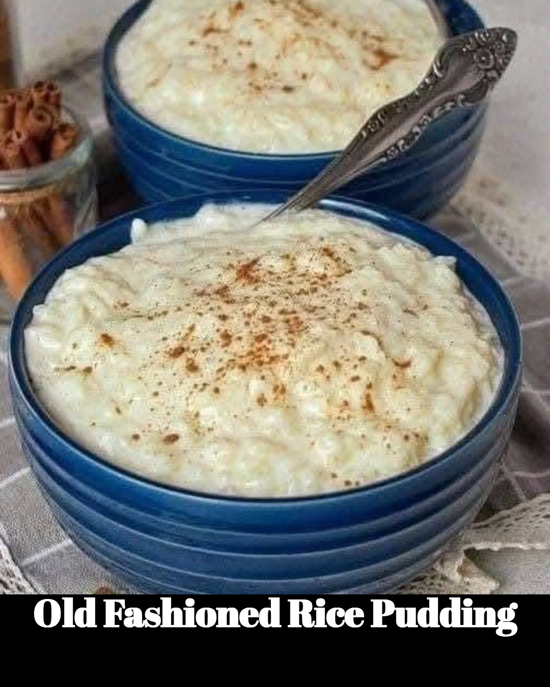 Creamy old-fashioned rice pudding served in a bowl with a sprinkle of cinnamon.