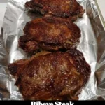 Juicy ribeye steak grilled to perfection, showcasing marbling and flavor