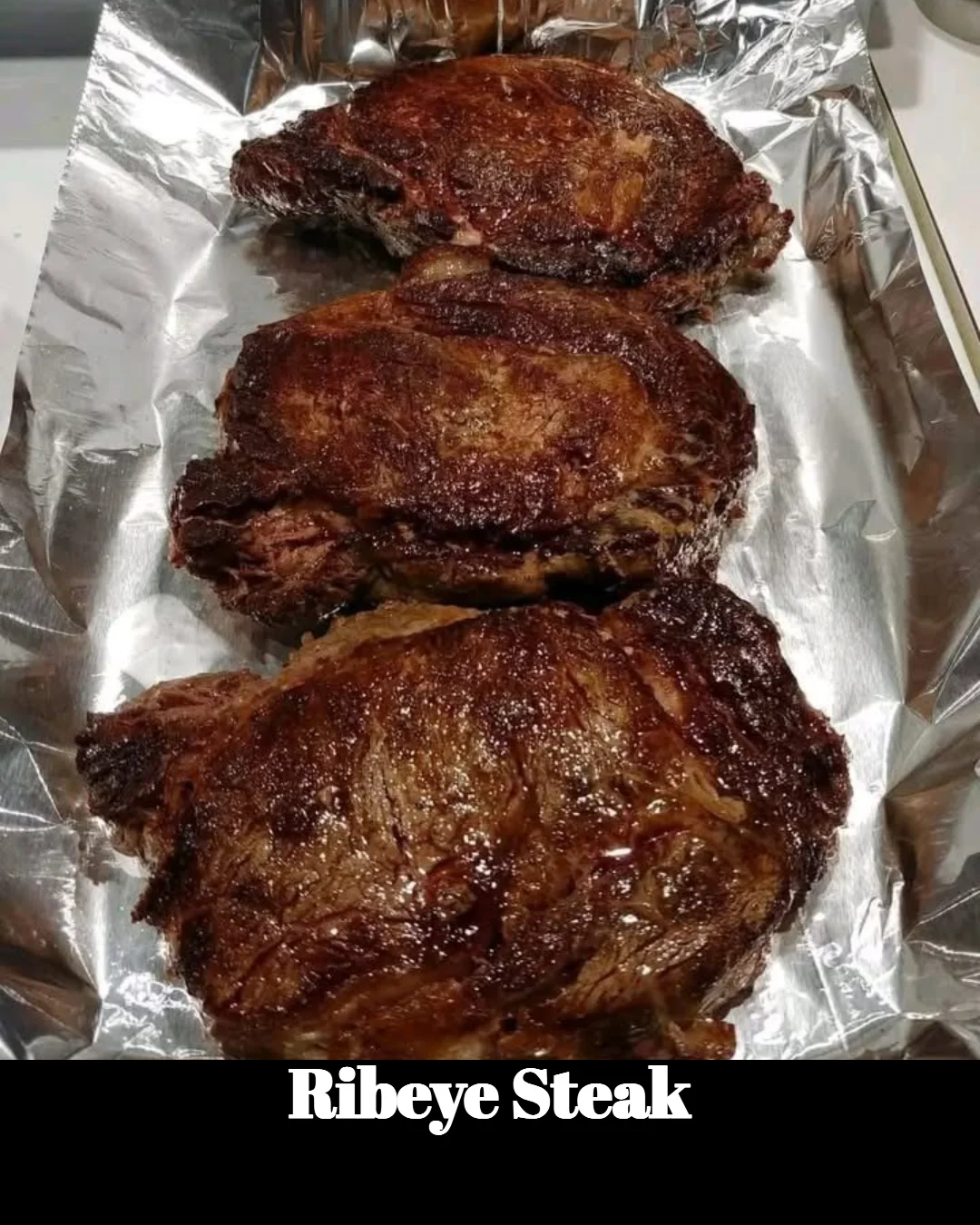 Juicy ribeye steak grilled to perfection, showcasing marbling and flavor