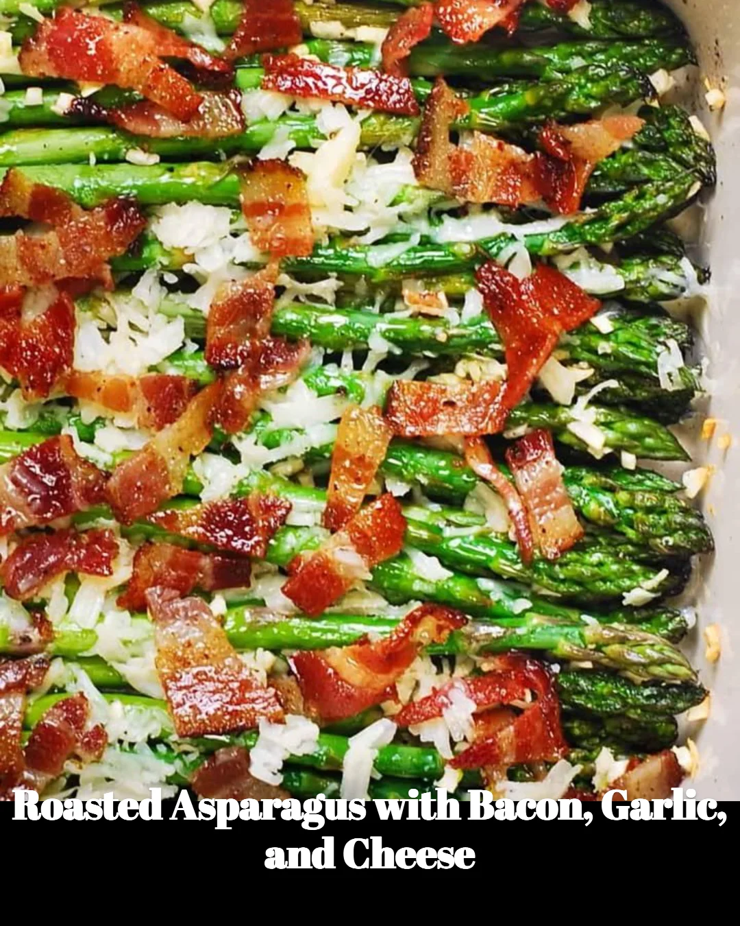 Plate of roasted asparagus with bacon, garlic, and cheese topping