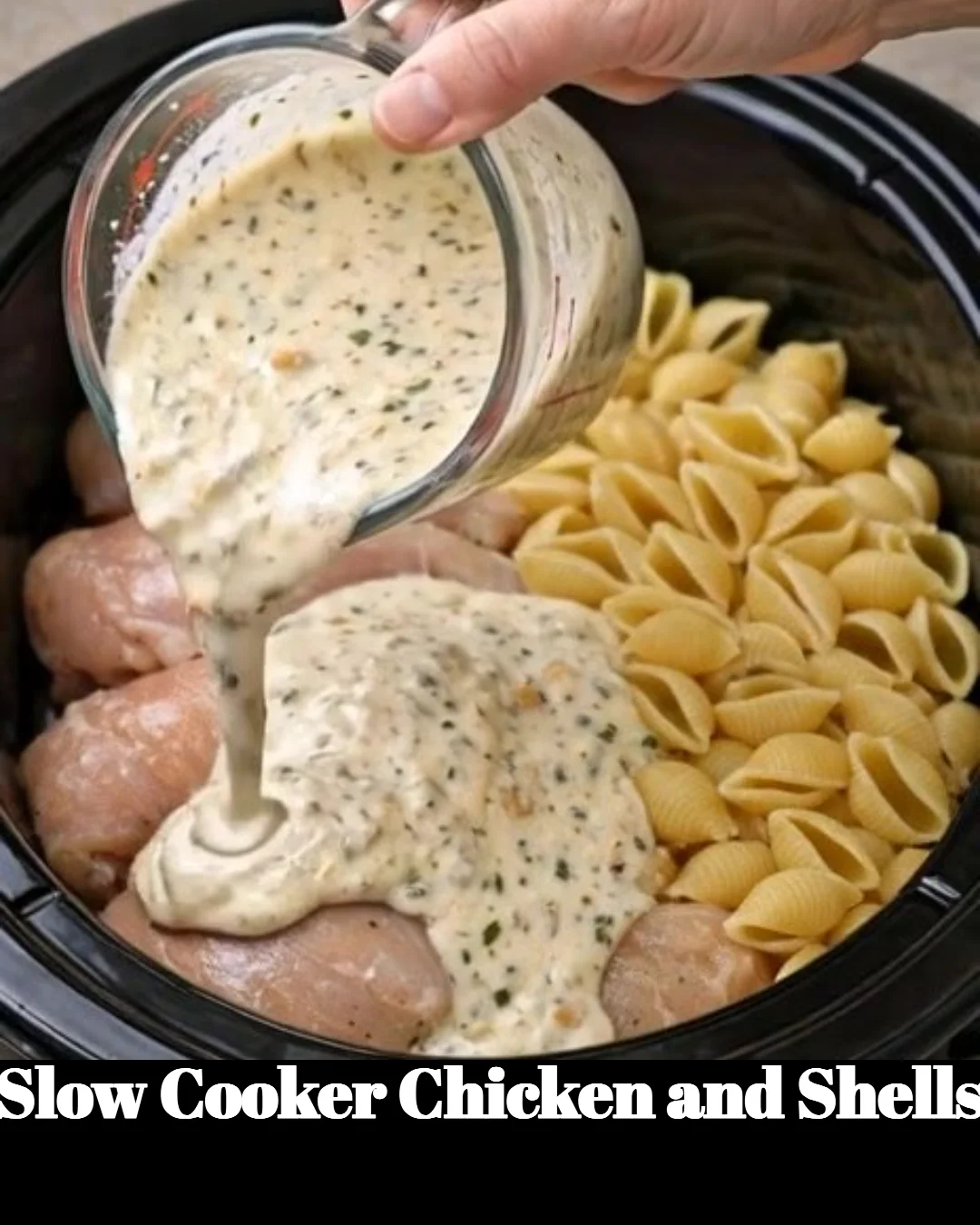 Bowl of Slow Cooker Chicken and Shells with herbs and cheese