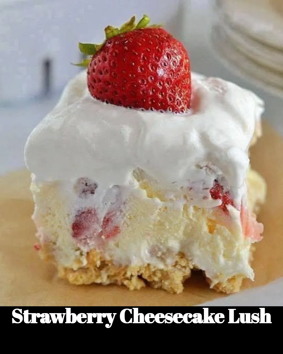 Delicious strawberry cheesecake lush dessert with fresh strawberries and creamy layers
