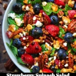 Fresh strawberry spinach salad with vibrant colors and healthy ingredients