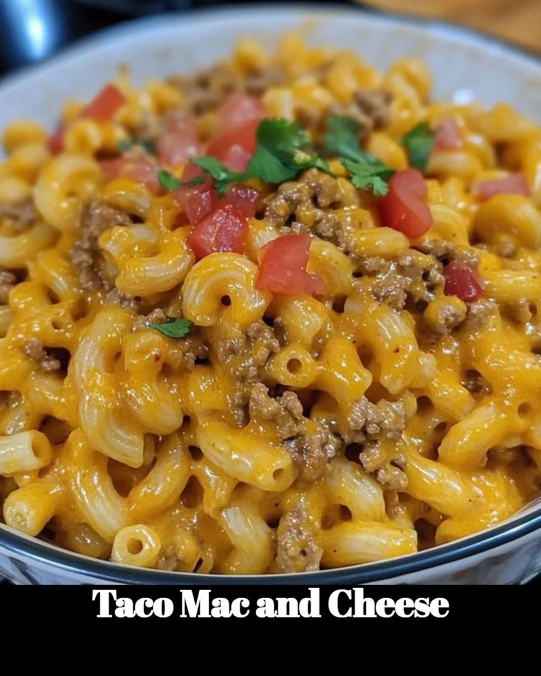 Delicious Taco Mac and Cheese in a creamy cheese sauce with taco toppings