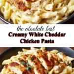 Delicious creamy white cheddar chicken pasta dish garnished with herbs.