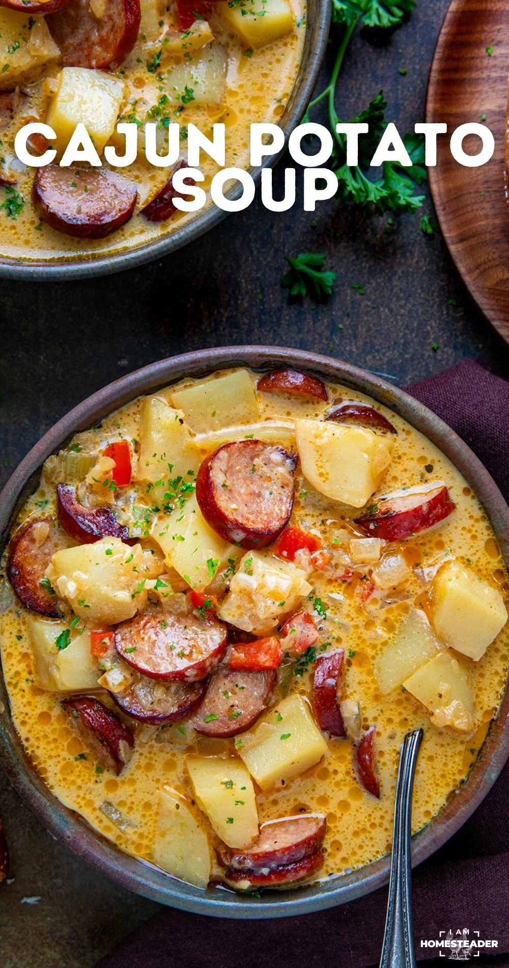 Delicious bowl of homemade Cajun Potato Soup garnished with herbs.